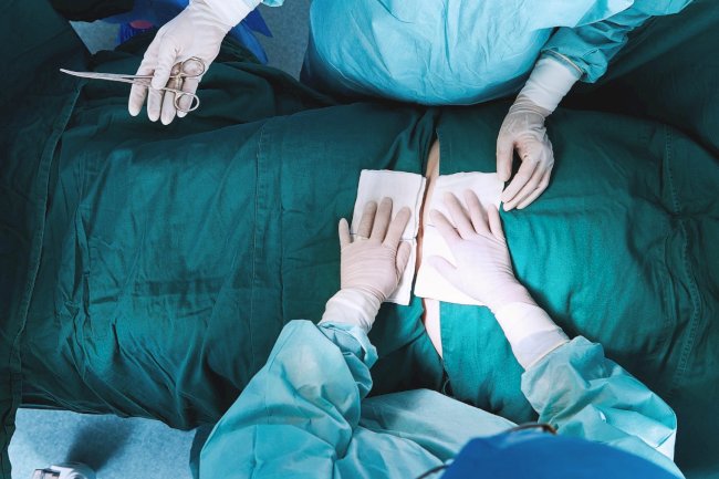 Can men benefit from tummy tuck surgery as much as women?